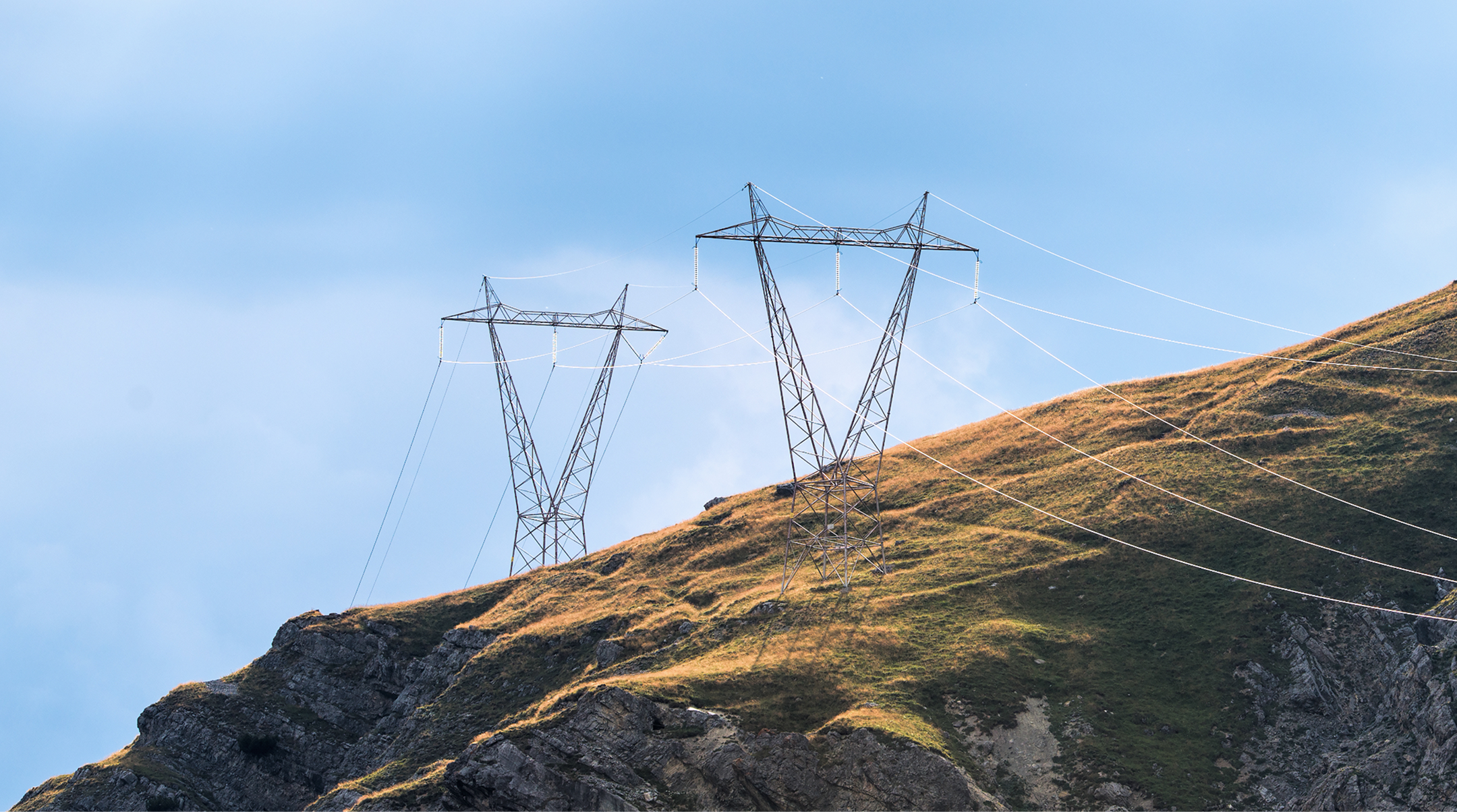 Pylons with electrical wires on a mountain